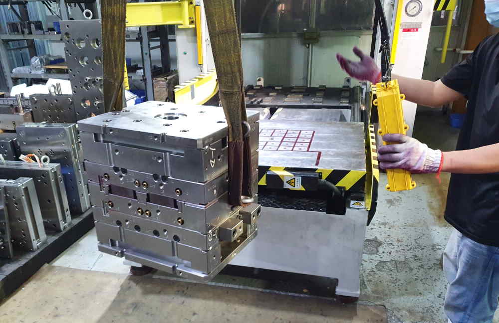 loading mold on spotting press