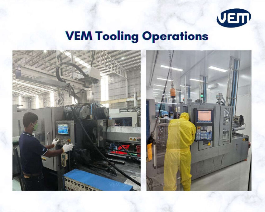 injection molding operator stands in front of machine